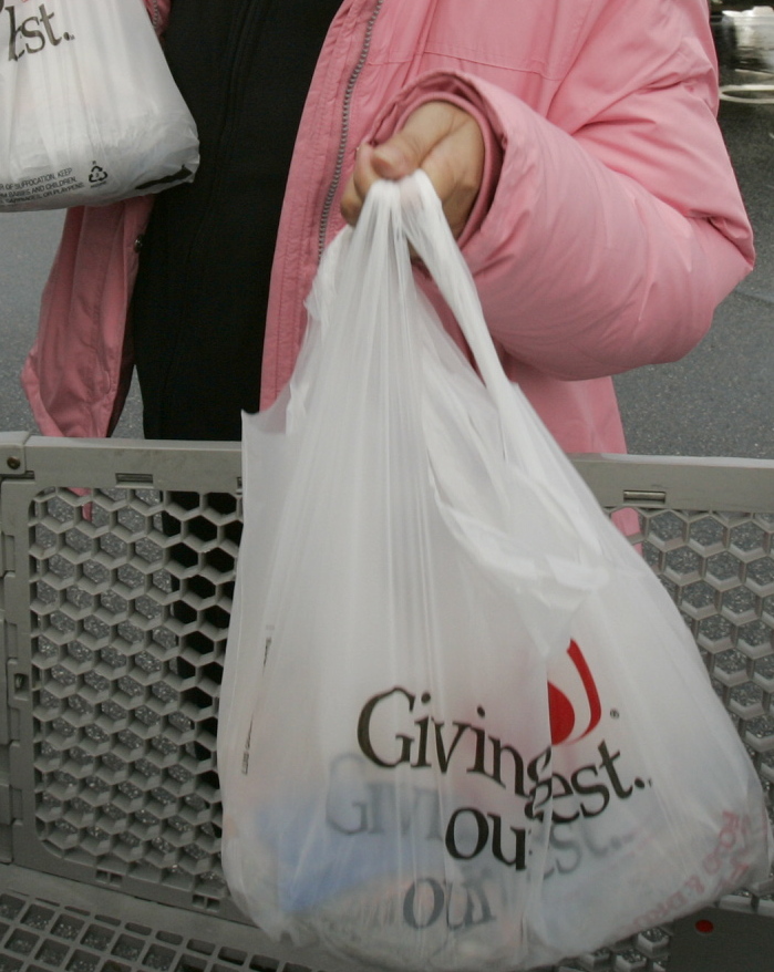One reason for imposing a fee on plastic bags is to encourage shoppers to supply their own bags.