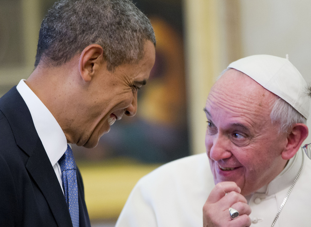 Pope Francis talks with President Barack Obama after a private audience Thursday at Vatican City. Obama says topics centered on the plight of the poor and world peace.