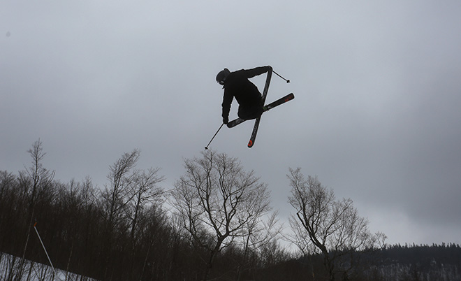 A skier clears the tree line while competing in the Dumont Cup on Friday.