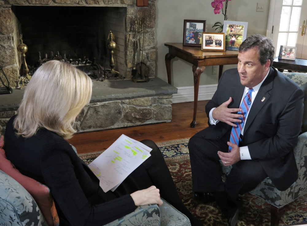 In this photo provided by ABC News, Diane Sawyer speaks to New Jersey Gov. Chris Christie at his home in Mendham, N.J., Thursday.