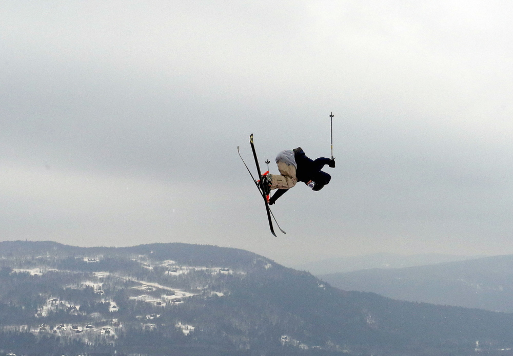 Keegan Kilbride of Portland goes high over a jump Friday while competing in the sixth annual Dumont Cup at Sunday River. Kilbride will compete in the freestyle junior world championships in Italy. He leaves Sunday.