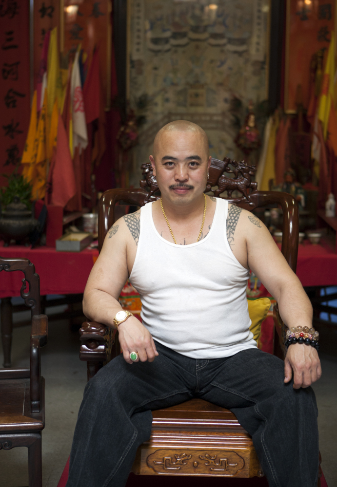 In this image provided by Jen Siska, Raymond “Shrimp Boy” Chow, poses for a portrait in San Francisco in July 2007. Investigators say Chow is the leader of one of the most powerful Asian gangs in North America.
