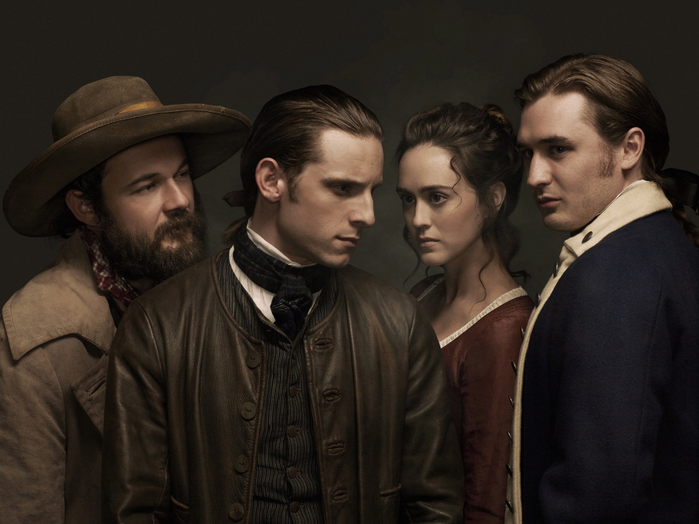 Characters in AMC’s “Turn” include, from left, Caleb (played by Daniel Henshall), Abraham Woodhull (Jamie Bell), Anna Strong (Heather Lind) and Ben Talmadge (Seth Numrich).