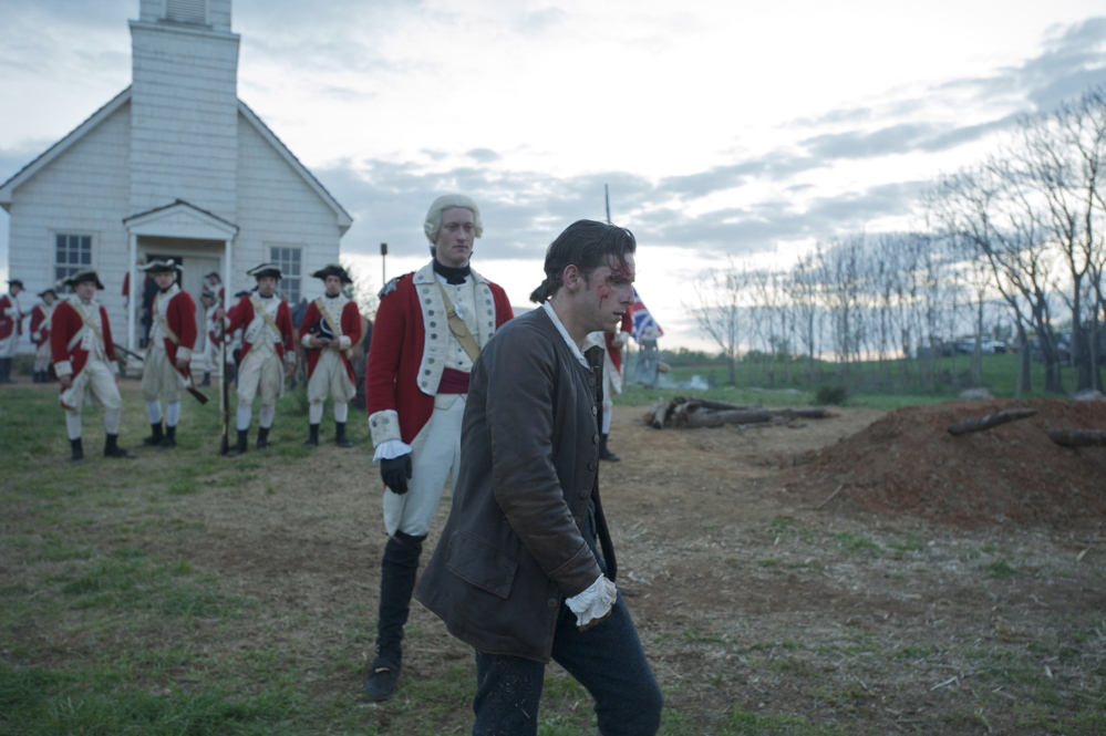 Captain Simcoe, played by Samuel Roukin, and Abraham Woodhull (Jamie Bell) are shown in the first episode of AMC’s “Turn,” a series that gives a more complex look at the American Revolution.