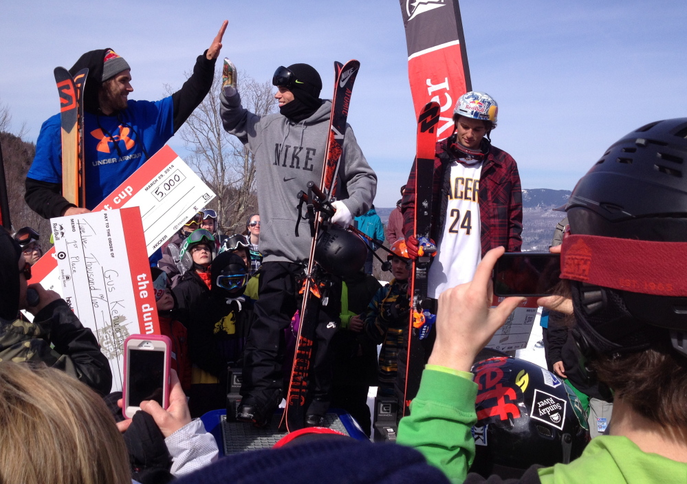 Gus Kenworthy, who won the Dumont Cup, gets a high-five Saturday from the third-place finisher, Bobby Brown. Nick Goepper took second.