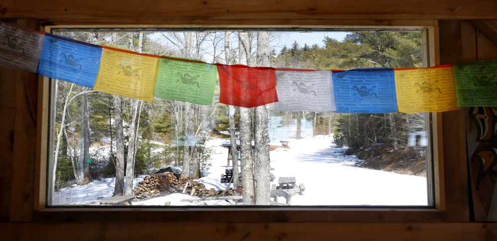 Prayer flags hang inside the Hi Hut, which was built during Hurricane Irene in 2011 at the Hidden Valley Nature Center, which is raising funds to expand its already impressive facilities.