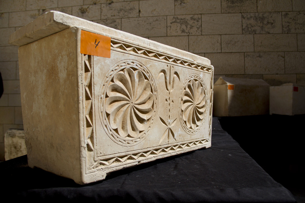 A 2,000 year-old Jewish burial box is on display in Jerusalem on Monday. The Israeli Antiquities Authority said the boxes were recovered Friday in Jerusalem when police observed a suspicious nighttime transaction.