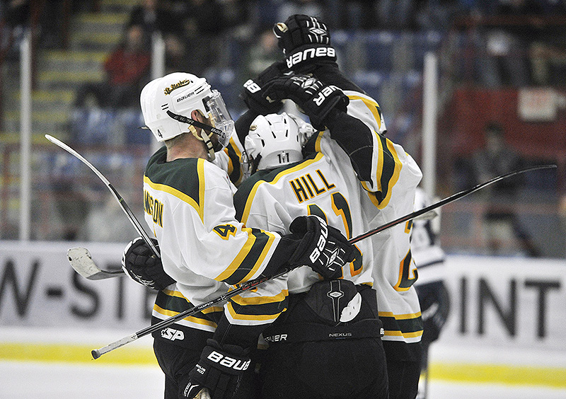 Michael Hill of St. Norbert celebrates with teammates Friday after giving the Green Knights a 3-2 lead on the way to a 6-2 victory against SUNY-Geneseo in the Division III semifinals at Lewiston. St. Norbert will meet Wisconsin-Stevens point in the final.