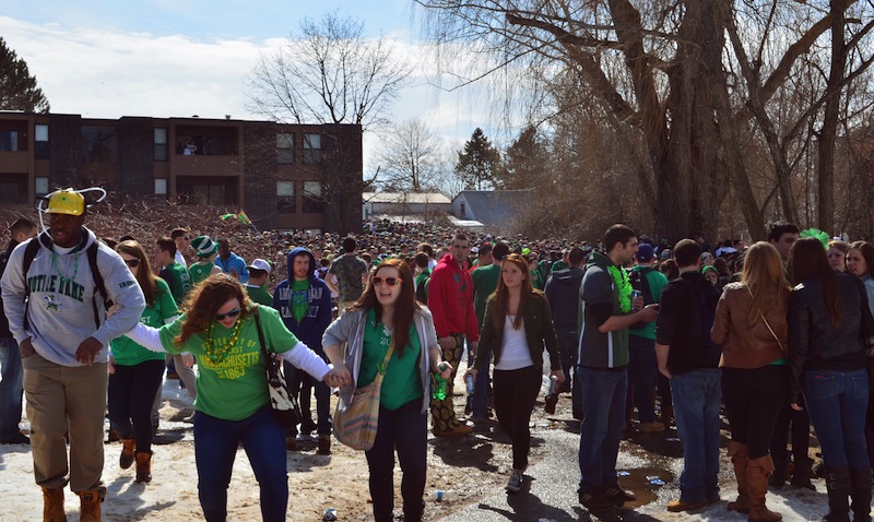 People gather for the pre-St. Patrick's Day "Blarney Blowout" near the University of Massachusetts in Amherst on Saturday.