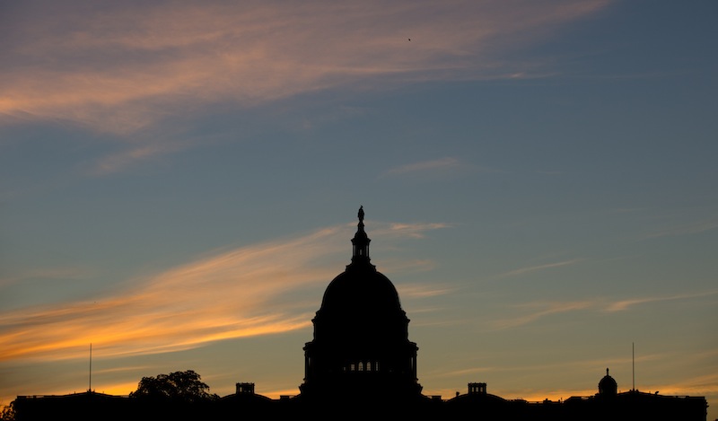 In this September 2013 file photo, the U.S. Capitol dome is silhouetted by the sunrise. Doctors who treat Medicare patients would get a last-minute reprieve from a scheduled 24 percent cut in their reimbursements from the government under a bill that’s on track to pass the House. It would be the 17th time Congress has stepped in with a temporary fix to a poorly designed Medicare fee formula that dates to a 1997 budget law. House action comes after efforts to permanently fix the formula appear to have fizzled.