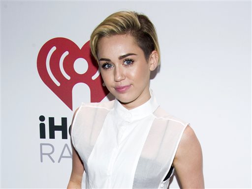 Miley Cyrus appears at the Z100's Jingle Ball in New York in this Dec. 13, 2013, photo.