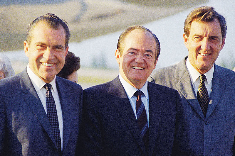 Richard Nixon, from left, Hubert Humphrey and Edmund Muskie pose for a photo in November 1968.