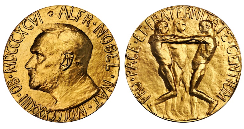 This undated photo provided by Stack’s Bowers Galleries shows both sides of a Nobel Peace Prize that was saved from possible destruction for the value of its gold. The 1936 medal is only the second Nobel Peace Prize to come to auction and marked the first time an individual from Latin America was recognized by the prestigious award. The 23-karat relic is being offered for sale in Baltimore on March 27, 2014, by the New York-based Stack’s Bowers Galleries.
