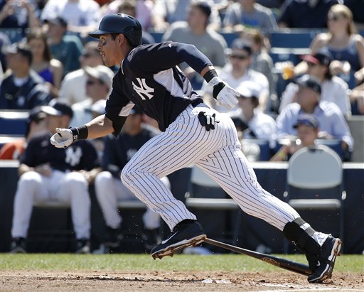 Jacoby Ellsbury of the New York Yankees runs on a double during a spring training game against the Tampa Bay Rays earlier this month.