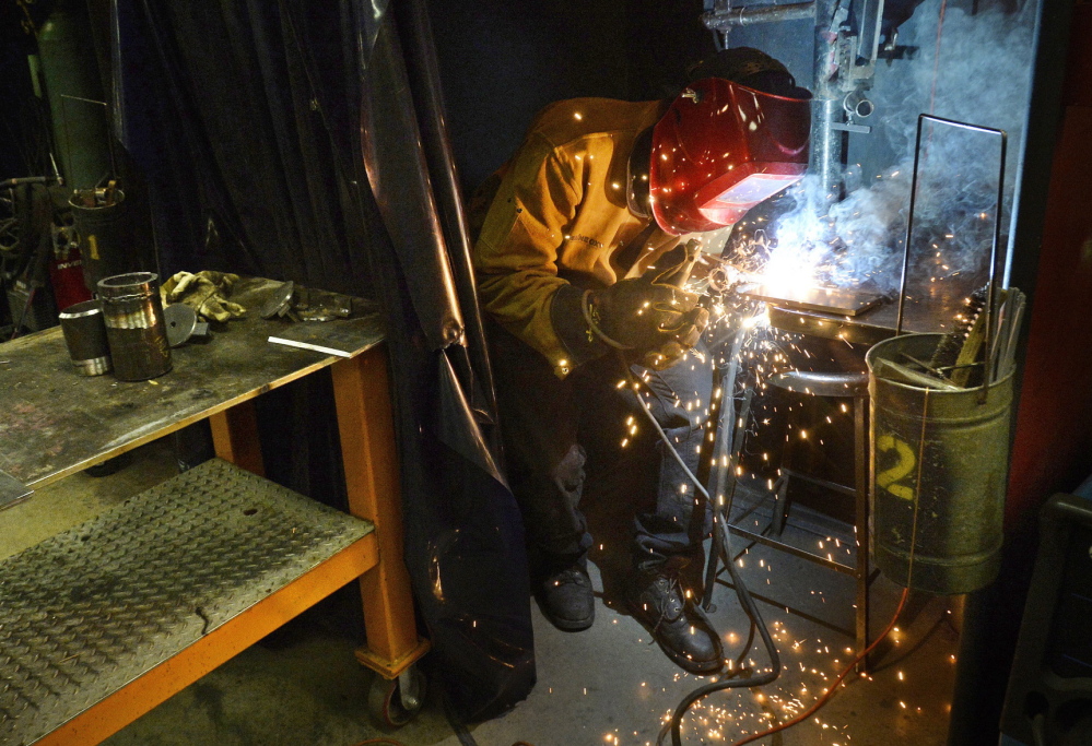 Luke Buss welds Tuesday during class at SMCC. Buss, 20, of Manchester, Vt., expects to graduate in May with an associate degree and has lined up an internship at a company near his hometown.