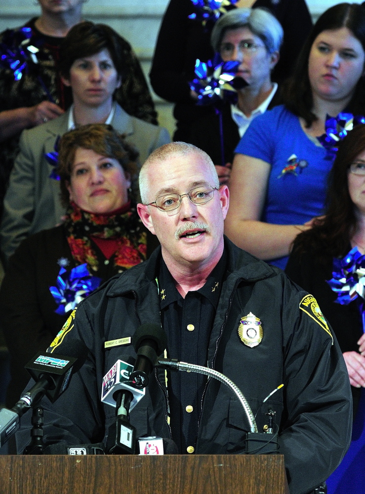 Augusta Police Chief Robert Gregoire speaks during a news conference held Tuesday in the Maine State House Hall of Flags to kick off Child Abuse Prevention Month.
