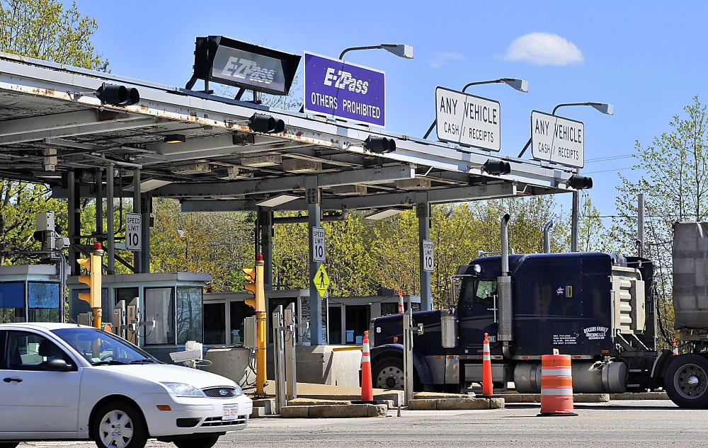 Vehicles pass through a toll booth in Maine. The use of E-ZPass in Northeast states makes it easier to track down toll cheats.