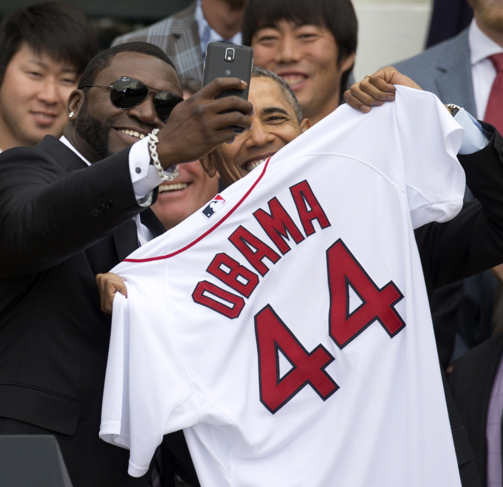After presenting President Obama with a Red Sox jersey, David Ortiz of the Boston Red Sox takes a selfie of the two of them, which he promptly tweeted. The Red Sox visited the White House on Tuesday.