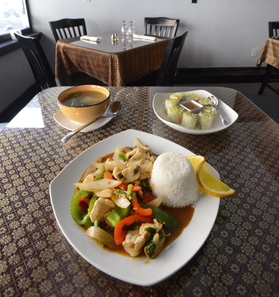 Thai 9’s basil chicken, wonton soup and fresh spring rolls.