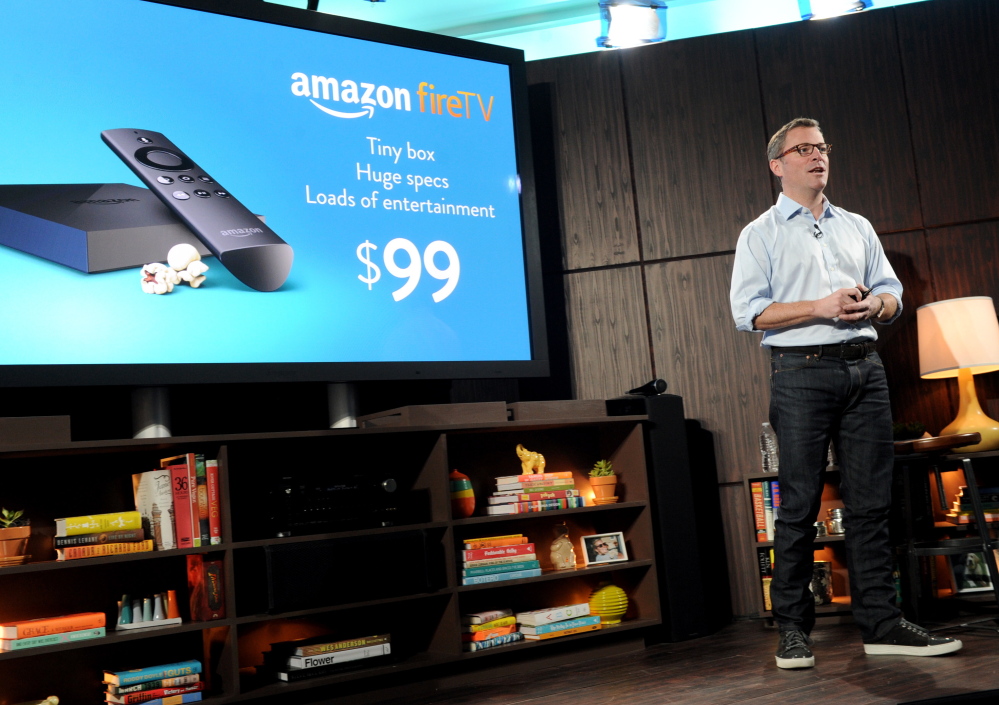 Peter Larsen introduces Amazon Fire TV in New York on Wednesday. The device offers Netflix, Hulu and other streaming channels in addition to Amazon Prime instant video.