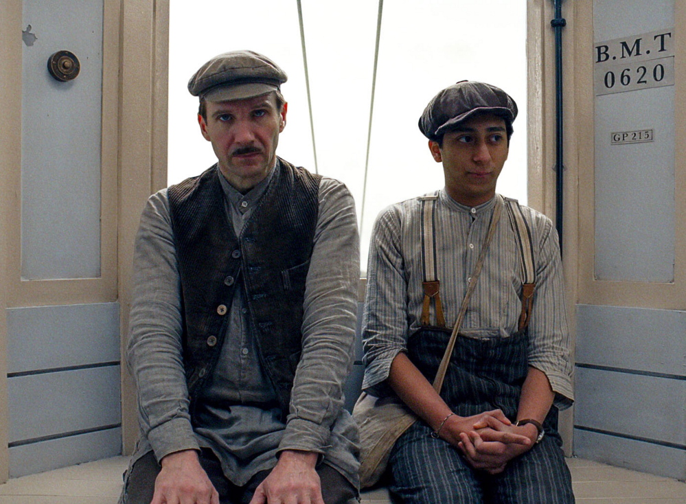 Ralph Fiennes, left, and Tony Revolori in “The Grand Budapest Hotel.”
