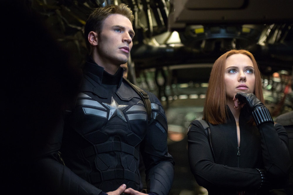 Chris Evans is Steve Rogers, aka Captain America, and Scarlett Johansson is Natasha Romanoff, aka the Black Widow, in “Captain America: The Winter Soldier.”