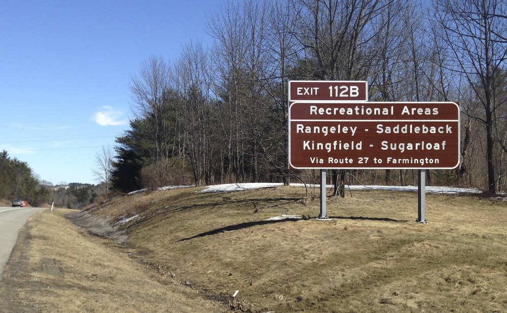 A sign for exit 112B on the Maine Turnpike near Augusta informs motorists of the exit to take for the Sugarloaf and Saddleback ski areas.