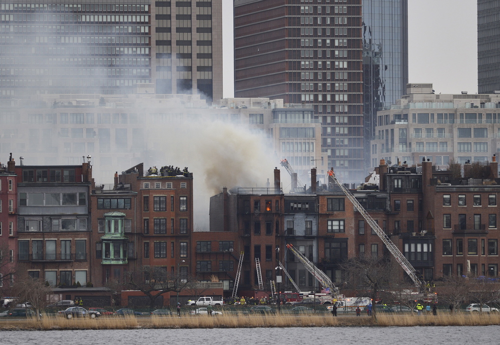 The multi-alarm fire that destroyed a Back Bay brownstone on March 26, 2014. Firefighters Michael Kennedy and Lt. Edward Walsh died when they got trapped in the basement of the building while fighting the blaze.