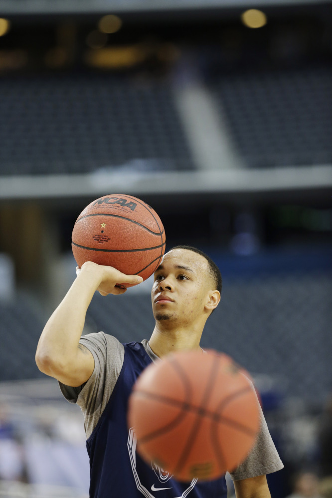 Connecticut guard Shabazz Napier drills during team practice for an NCAA Final Four tournament college basketball semifinal game Friday, April 4, 2014, in Dallas. Connecticut plays Florida on Saturday, April 5, 2014. (AP Photo/David J. Phillip)