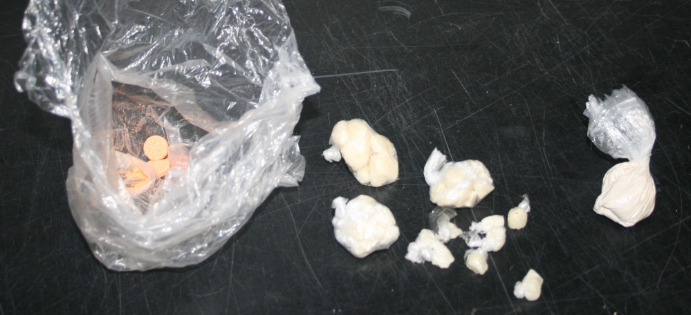 Saco police confiscated heroin, cocaine base and Suboxone pills after a traffic stop Wednesday.