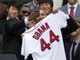 Boston Red Sox player David “Big Papi” Ortiz takes a selfie with President Barack Obama on Tuesday, an image that went viral and triggered days of coverage after Samsung said the picture was a publicity stunt for the phone maker.