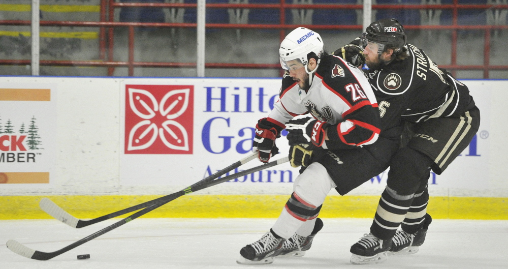 It would be a reach to say the 2013-14 season has been anything less than disastrous for the Portland Pirates, notwithstanding the efforts of players like left wing Darian Dziurzynski, shown vying for a puck against the Hershey Bears at the Colisee.