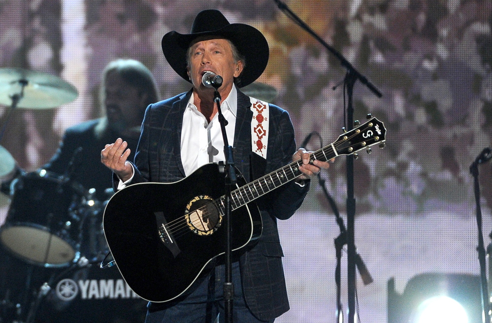George Strait performs on stage at the 49th annual Academy of Country Music Awards on Sunday in Las Vegas.