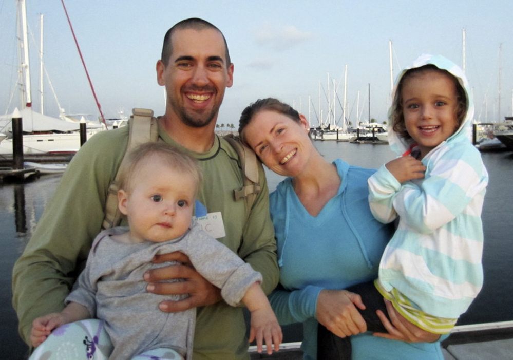This undated image provided by Sariah English shows Eric and Charlotte Kaufman with their daughters, Lyra, 1, and Cora, 3. Rescuers have stabilized the condition Lyra. Their boat, the 36-foot Rebel Heart, was about 900 nautical miles southwest of Cabo San Lucas when they sent a satellite call for help to the U.S. Coast Guard saying their 1-year-old girl aboard was ill.
