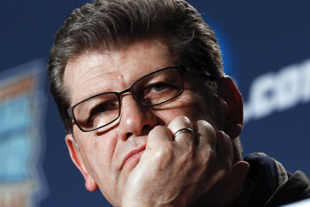 Connecticut head coach Geno Auriemma listens to a question during a news conference at the NCAA women’s Final Four college basketball tournament in Nashville, Tenn. Connecticut faces Notre Dame in the championship game.