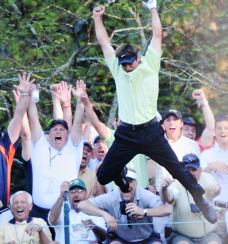 Think Trevor Immelman was happy, hitting a hole-in-one on the 16th at the Masters in 2005? Check out two fans from Maine. That’s David Chipman of Brunswick, second left, and David Ray of Yarmouth, behind Immelman’s shoe.