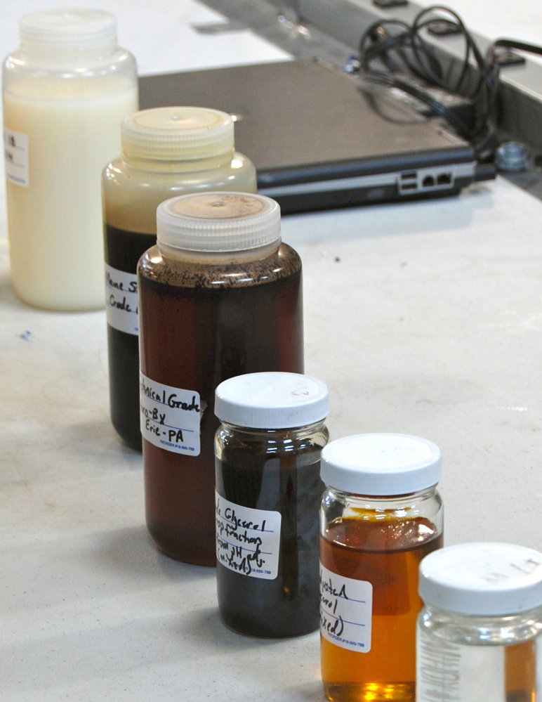 Samples of different formulas of glycerol and diesel fuel are shown at the SeaChange lab in Bucksport.