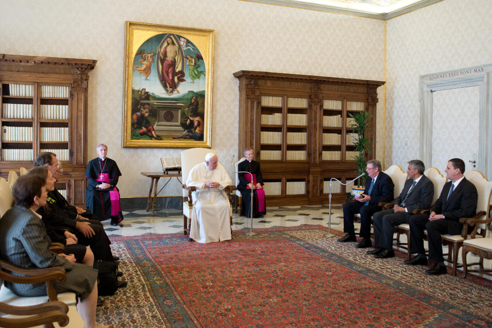 Pope Francis meets members of the International Catholic Child Bureau at the Vatican on Friday.