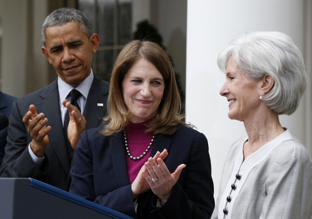 President Obama, and his nominee for Health and Human Services secretary, current Budget Director Sylvia Mathews Burwell, center, applaud outgoing Health and Human Services Secretary Kathleen Sebelius on Friday in the Rose Garden at the White House in Washington.