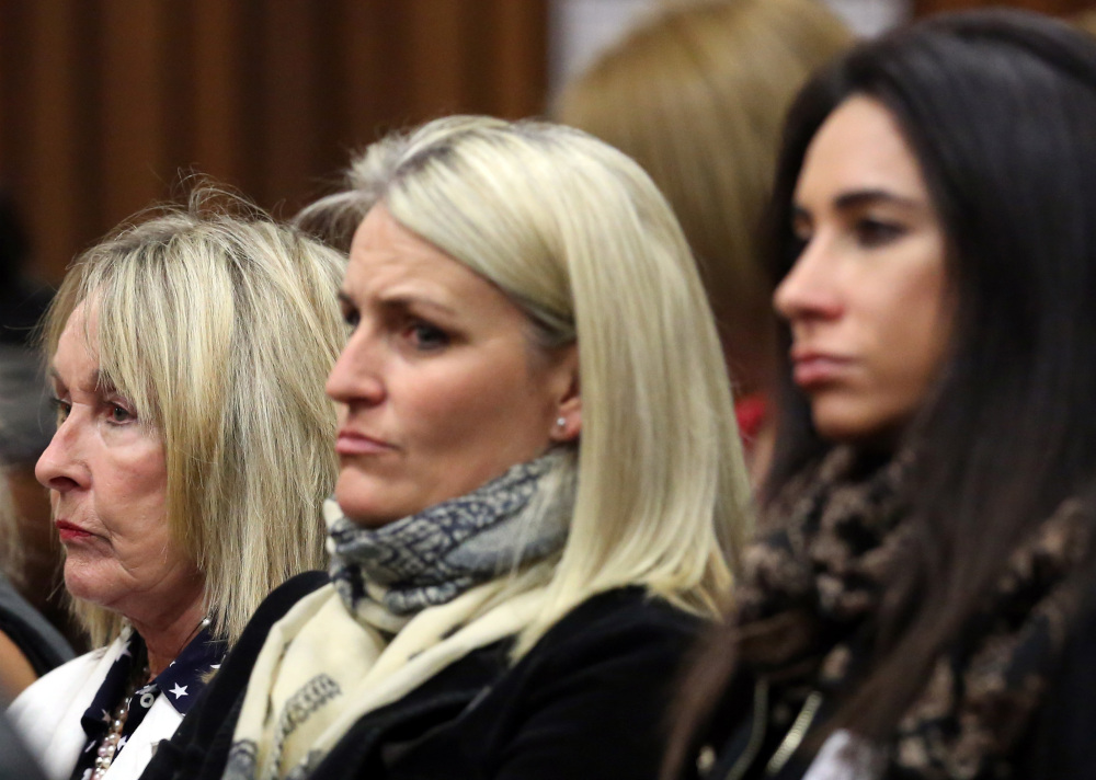 June Steenkamp, left, mother of the late Reeva Steenkamp, listens in court in Pretoria, South Africa, on Friday.