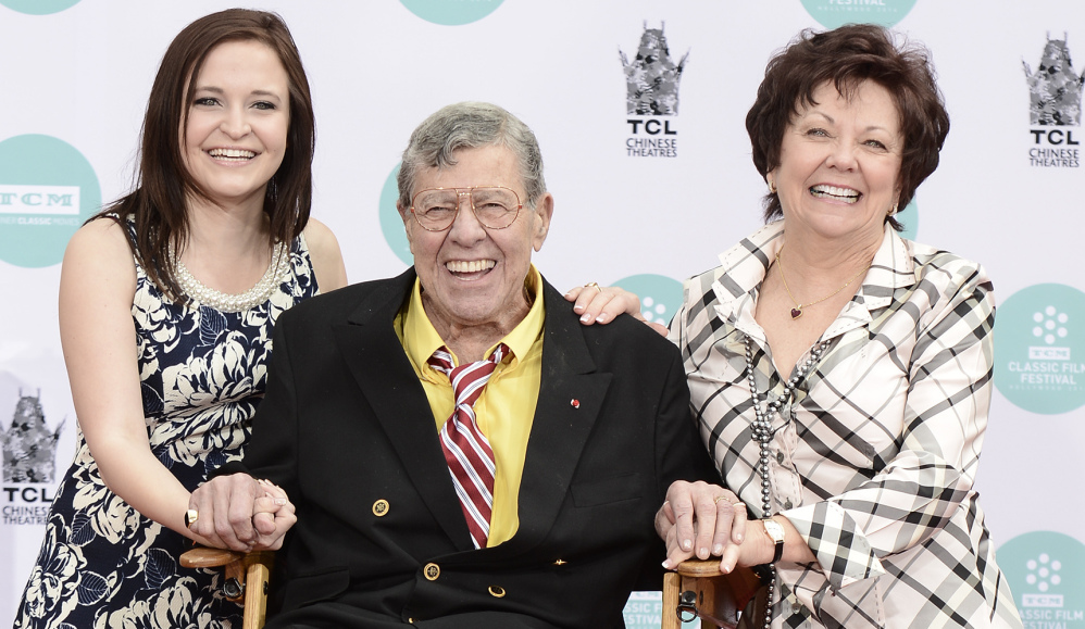 Jerry Lewis, his wife, SanDee Pitnick, right, and his daughter Danielle Lewis pose in Los Angeles on Saturday.