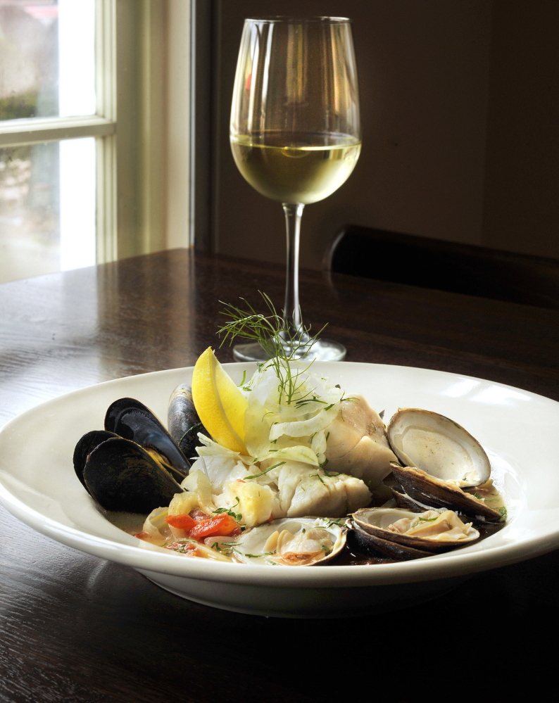 Azure Cafe’s Zuppa de Pesce features Maine mahogany clams, mussels and Maine white fish in a saffron broth with fresh fennel slaw.