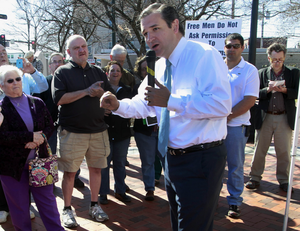 Sen. Ted Cruz, R-Texas, speaks at a “Get Out the Vote” rally Saturday in Nashua, N.H. At a conservative gathering, he promised to “repeal every single word of Obamacare.”