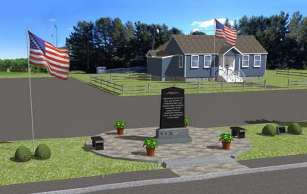 The memorial plot would feature an almost 9-foot-tall polished black granite stone inscribed with a verse memorializing fallen and living military veterans. Stone benches and decorative paving stones would enhance the display on Depot Road in Falmouth.