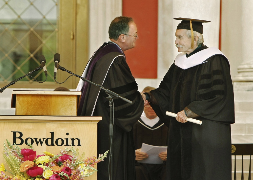 Barry Mills, left, president of Bowdoin College in Brunswick, congratulates playwright Edward Albee on receiving an honorary degree at the 204th commencement at Bowdoin College in Brunswick in 2009.
