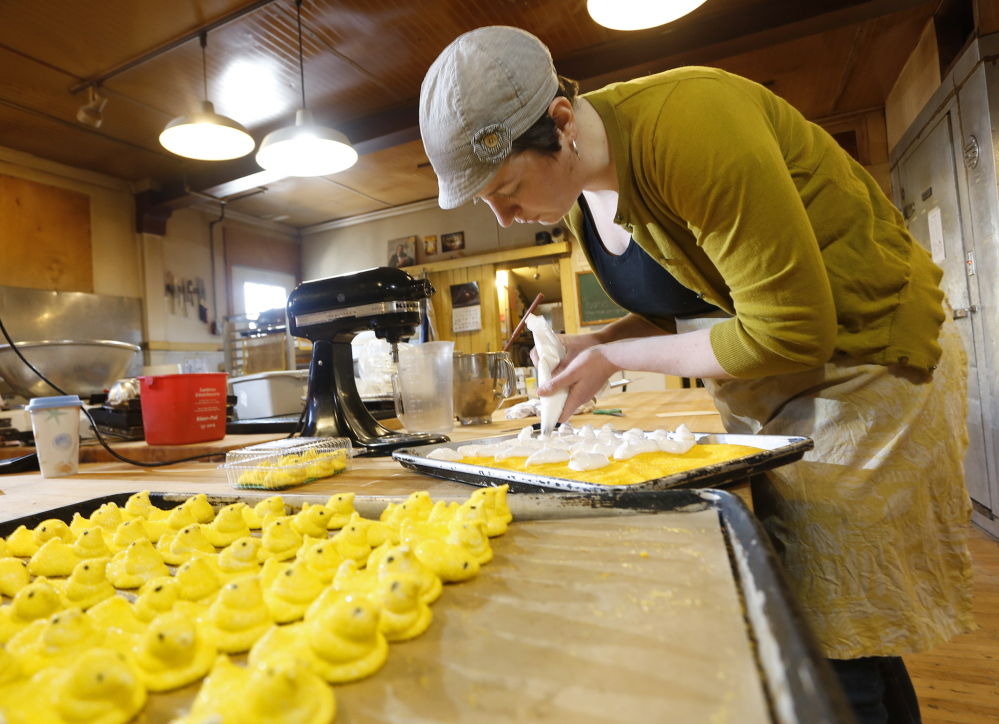 Kelly Donohoe works on a batch of Rosemont Markets’ take on Peeps, the iconic Easter candy that (sadly, some say) aren’t just for Easter anymore. The version that Rosemont is producing for this Easter season contains just three main ingredients: sugar, gelatin and vanilla.