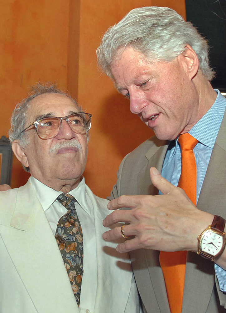 In this March 26, 2007 file photo released by Colombia’s News Service SNE, former U.S. President Bill Clinton, right, speaks with Colombian Nobel laureate Gabriel Garcia Marquez at the opening ceremony of International Congress of Spanish Language in Cartagena, Colombia.
