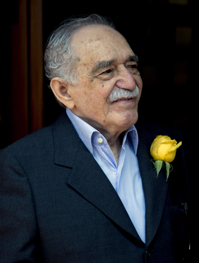In this March 6, 2014 file photo, Colombian Nobel Literature laureate Gabriel Garcia Marquez greets fans and reporters outside his home on his 87th birthday in Mexico City. Marquez died Thursday April 17, 2014 at his home in Mexico City.