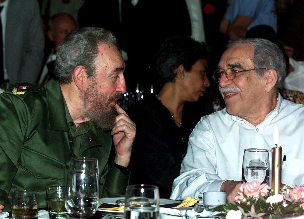 Cuba’s leader Fidel Castro, left, and Colombian Nobel laureate Gabriel Garcia Marquez speak during a dinner at the annual cigar festival in Havana, Cuba.