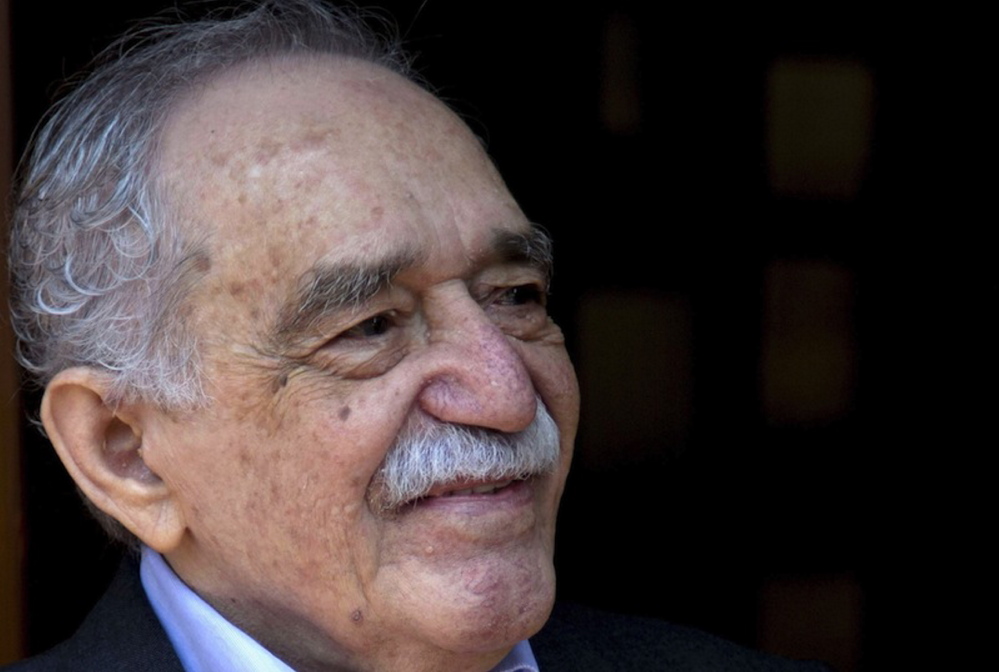 In this March 6, 2014 photo, Colombian Nobel Literature laureate Gabriel Garcia Marquez greets fans and reporters outside his home on his 87th birthday in Mexico City. Garcia Marquez died Thursday April 17, 2014 at his home in Mexico City.